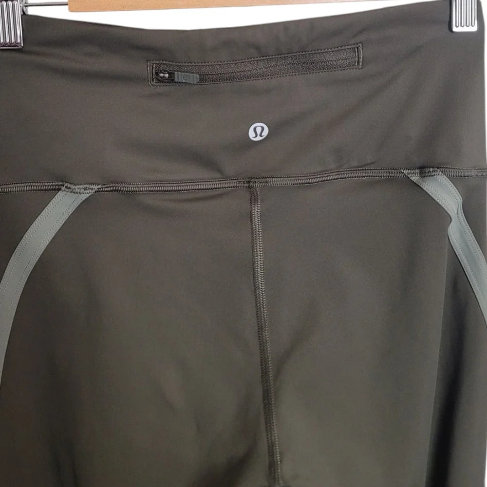Lululemon Zip The Line Crop Leggings in Dark Olive / Grey Sage